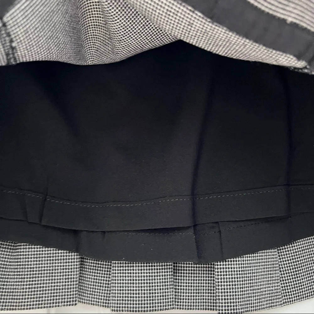 White House Black Market micro check skirt fully lined. Pleated in back.Size 6